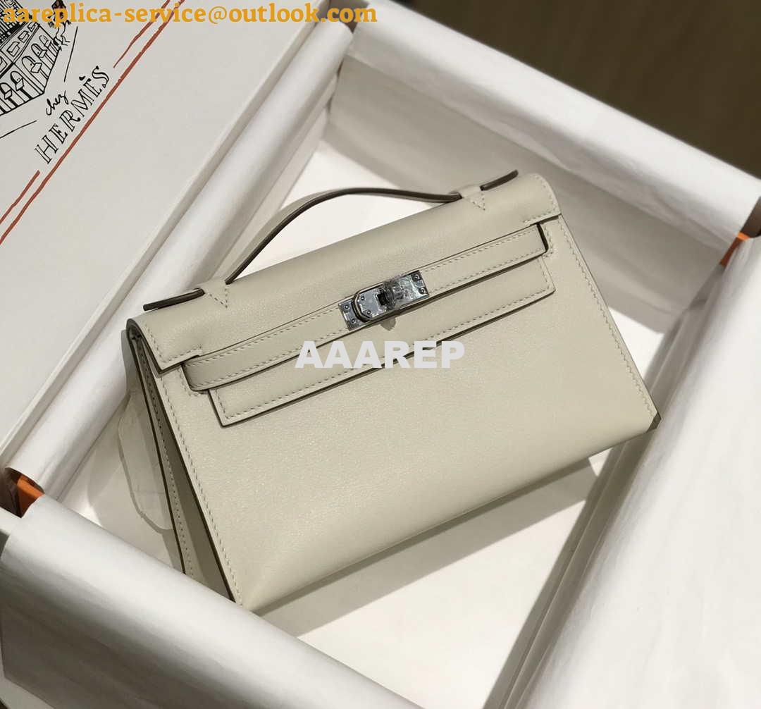 Replica Hermes Mini Kelly Pouchette Swift Leather clutch bag Silver H230255 2 Replica Hermes Mini Kelly Pouchette Swift Leather clutch bag Silver H230255 2