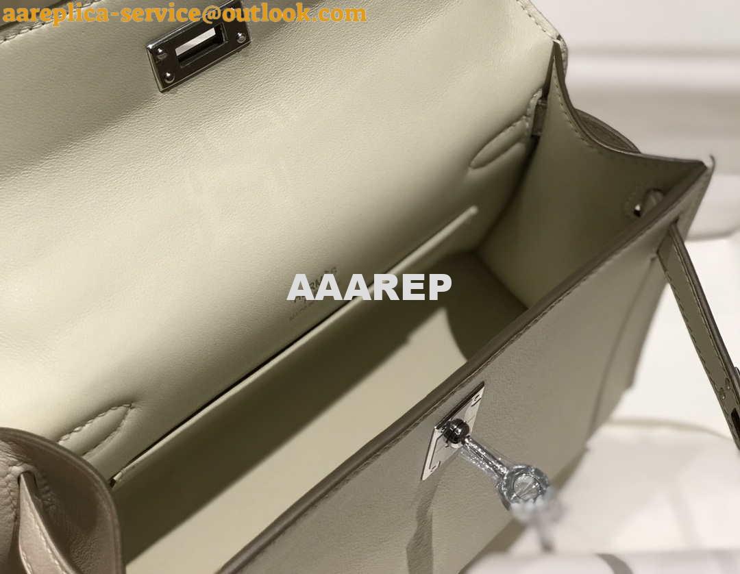 Replica Hermes Mini Kelly Pouchette Swift Leather clutch bag Silver H230255 8 Replica Hermes Mini Kelly Pouchette Swift Leather clutch bag Silver H230255 8