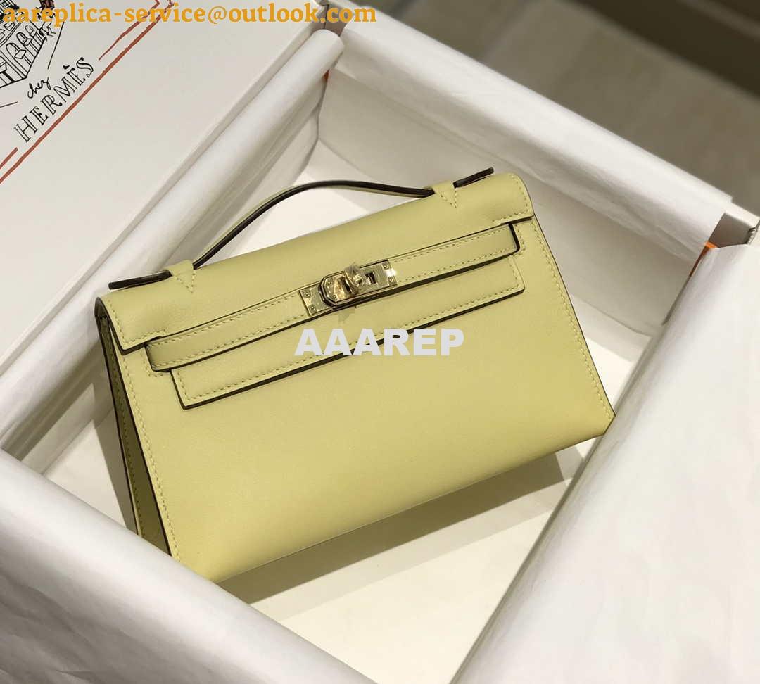 Replica Hermes Kelly Pouchette Swift Leather clutch bag Gold H230272 2 Replica Hermes Kelly Pouchette Swift Leather clutch bag Gold H230272 2
