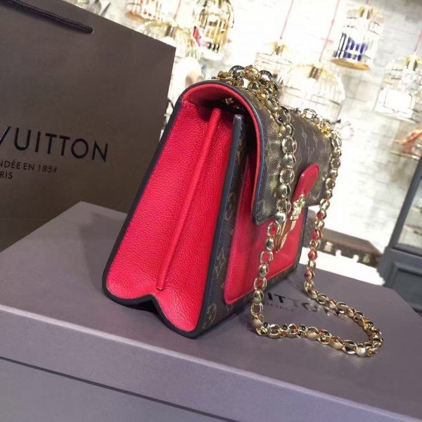 Louis Vuitton Monogram Canvas and Black Leather Victoire Bag For