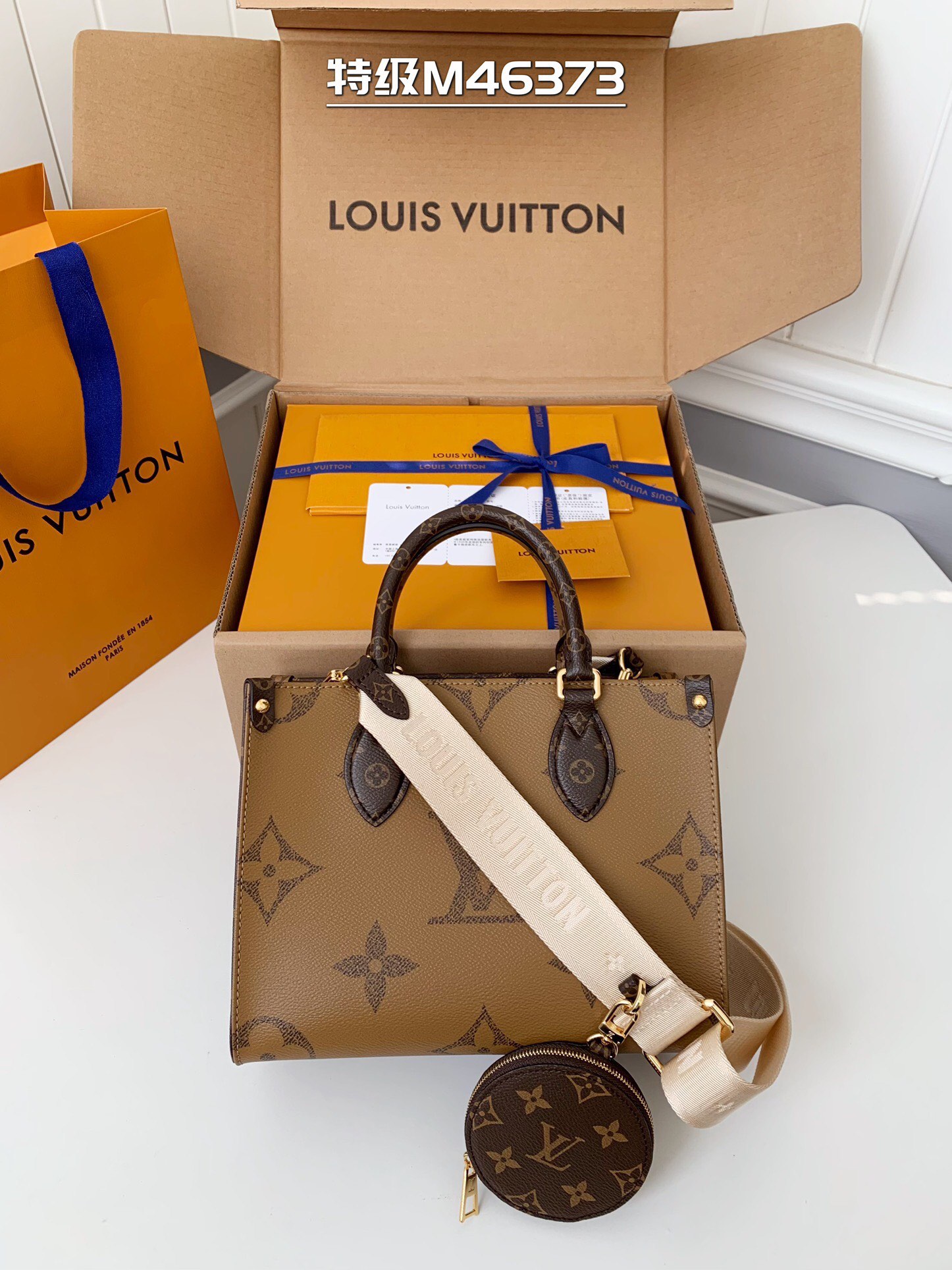Louis Vuitton OnTheGo PM Monogram/Monogram Reverse in Coated