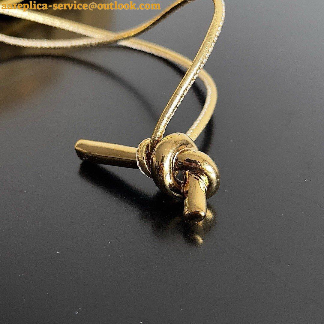 Replica Bottega Veneta Andiamo Clutch with Handle in Gold Metallic Leather Replica Bottega Veneta Andiamo Clutch with Handle in Gold Metallic Leather